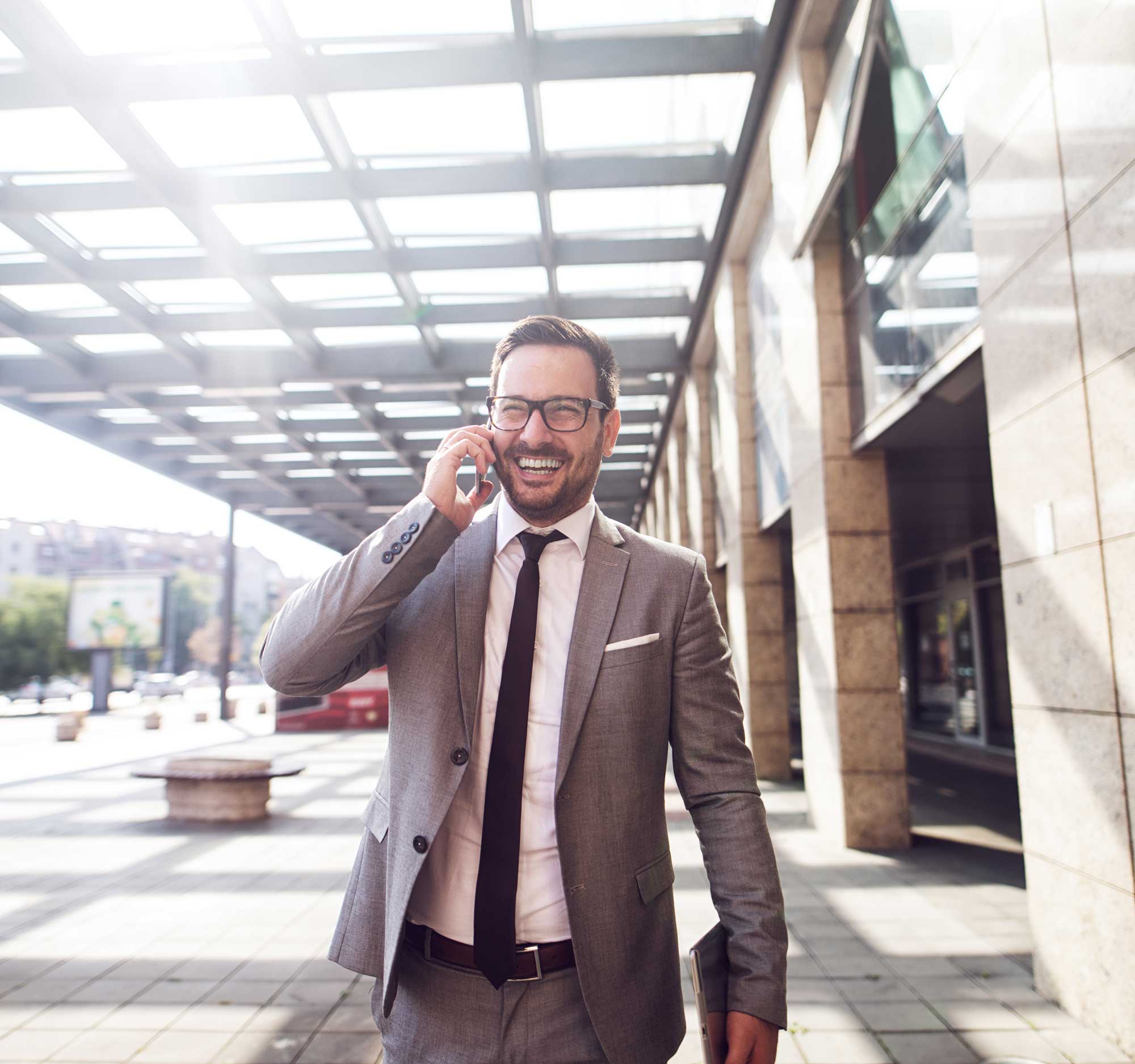 smiling-young-businessman-walking-with-confidence-to-a-new-business-meeting